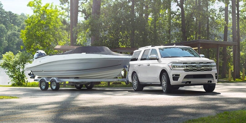 2024 Ford Expedition towing a boat